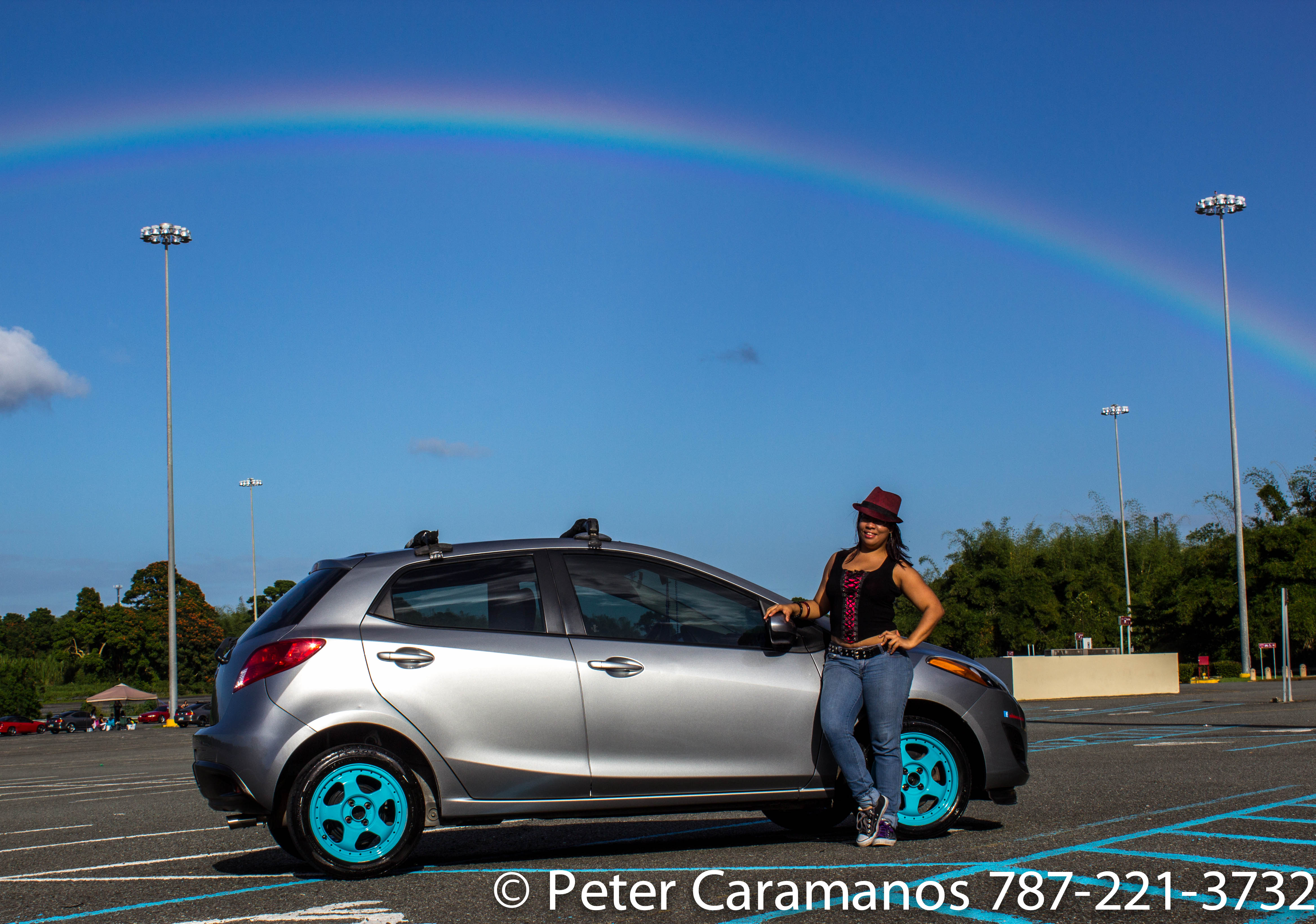 A girl, a Mazda 2 and a Rainbow