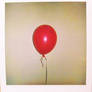 POLAROID: red balloon.