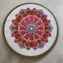 pink embroided geometric islamic pattern