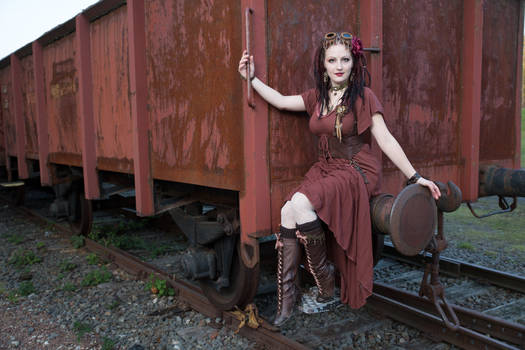 [STOCK] Steampunk Girl sitting on a wagon