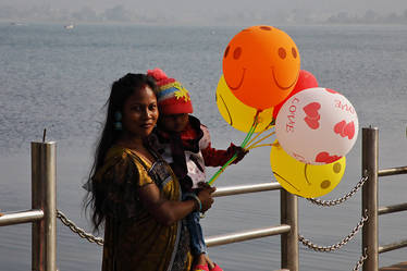 Woman, child and balloons