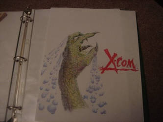 x-com. colored pencil