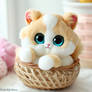 puffpals cute cat in basket