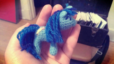 Tiny blue writer pony