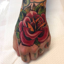 Rose on hand