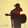 silhouette of a musician