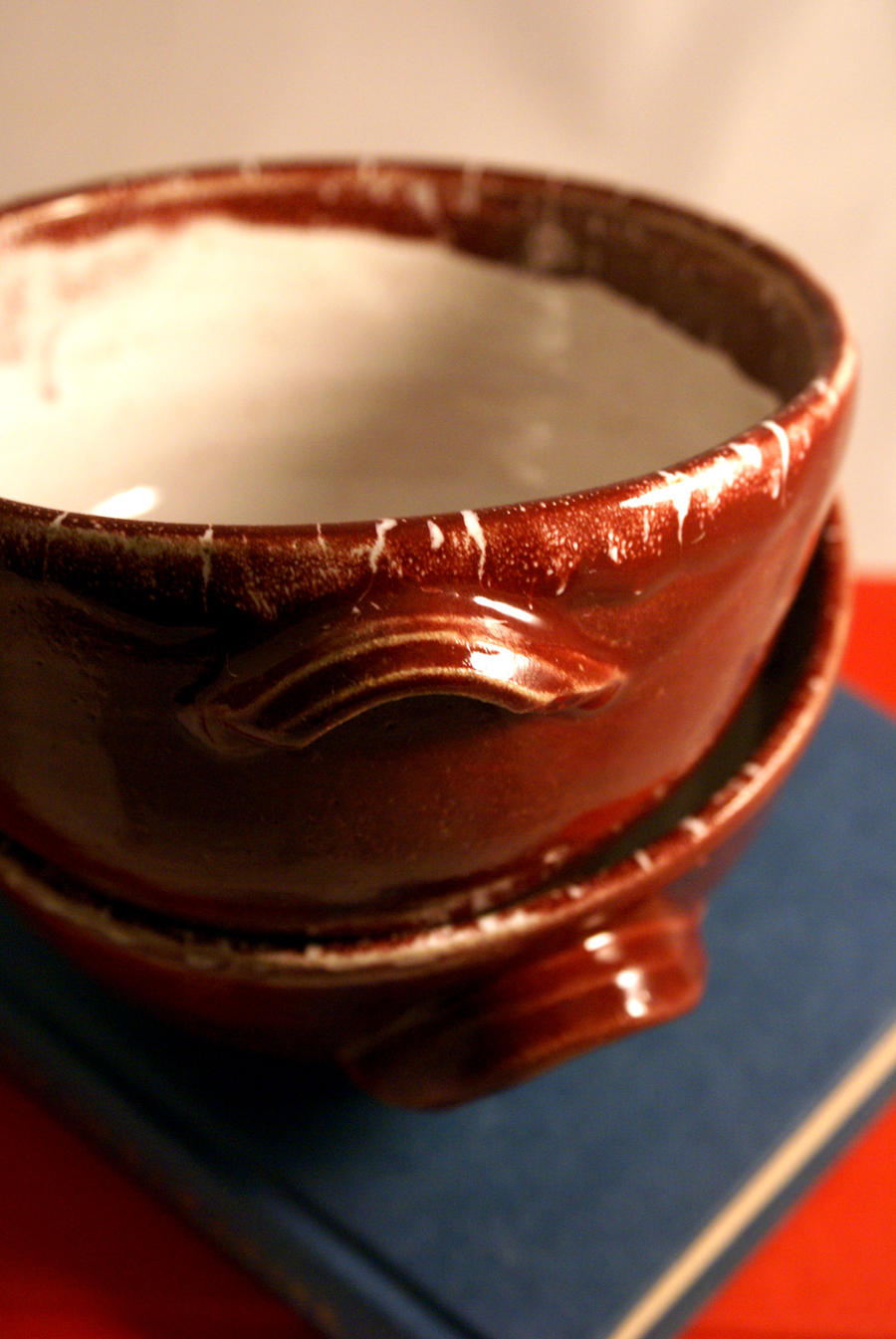 Two soup bowls in ruby red