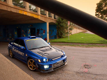 Subaru WRX under the bridge