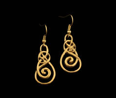 Urnes serpent earrings