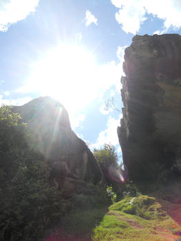 Sun behind the rocks