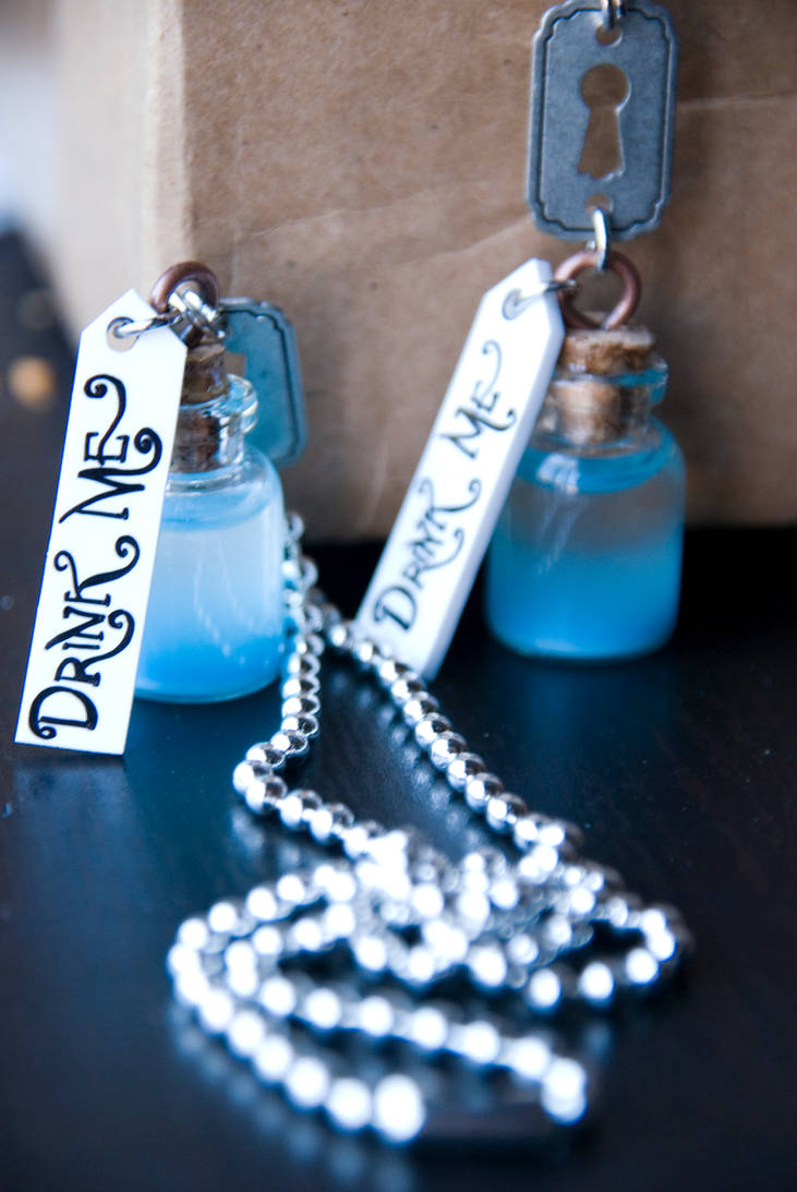 Wonderland Inspired ' Drink Me ' Necklaces by IvrinielsArtNCosplay