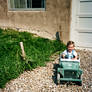 EXT. DRIVEWAY - DAY