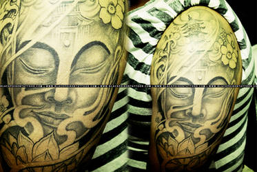 Full Sleeve Tattoo of Lord Buddha with Buddhist Te