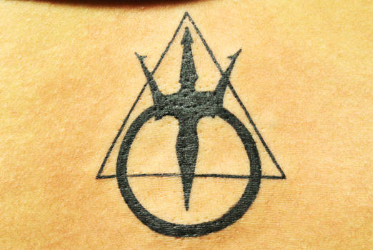 Tattoo of The mark of The Warriors of Poseidon