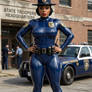 Ebony latex police woman