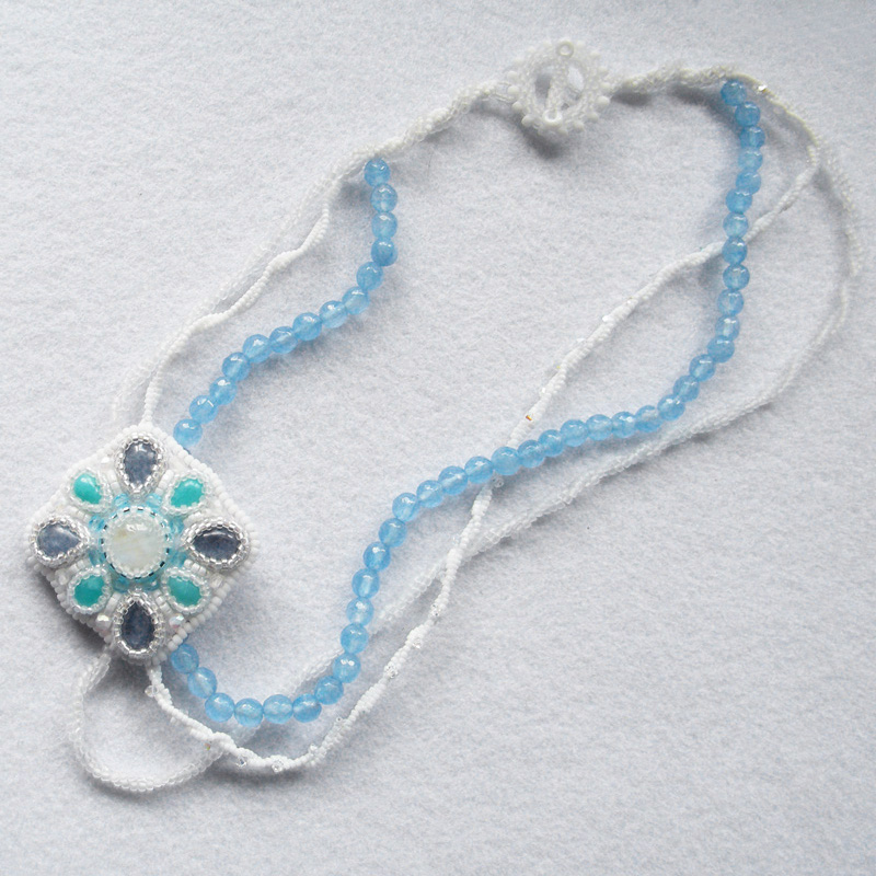 Icy embroidered wedding necklace with kyanites