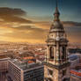 City in the tower's shadow