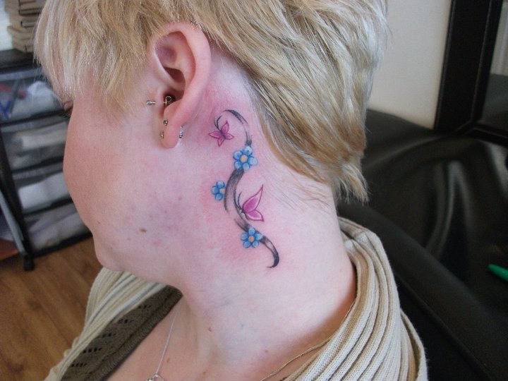 butterflies and flowers tattoo