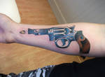 traditional revolver tattoo