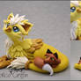 Solio the griffin with a fox pet