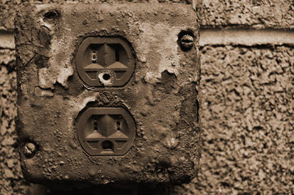 Rusted Wall Outlet