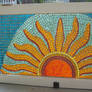 Stained glass mosaic sun