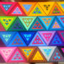 The Rainbow Triangles with Four Small Triangles