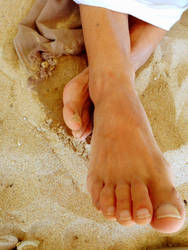 Feet on sand