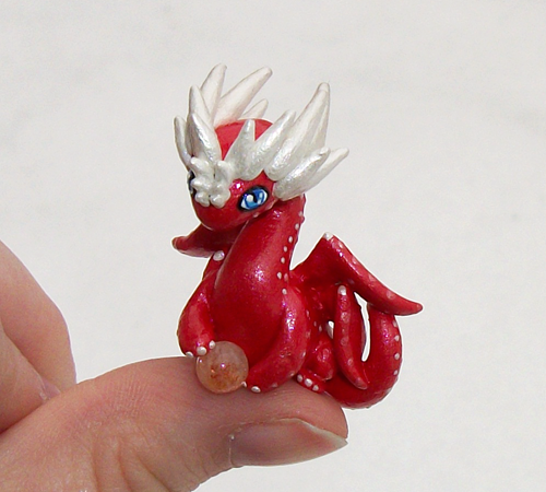 Crimson 'Thumb' Dragon