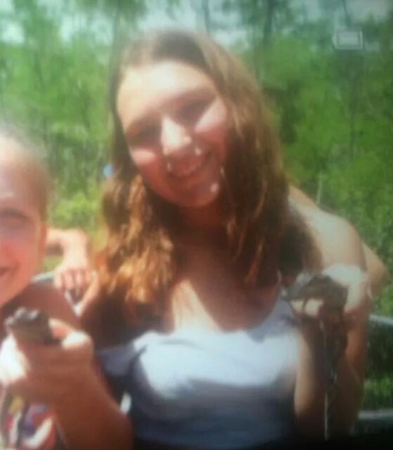 holding baby gators