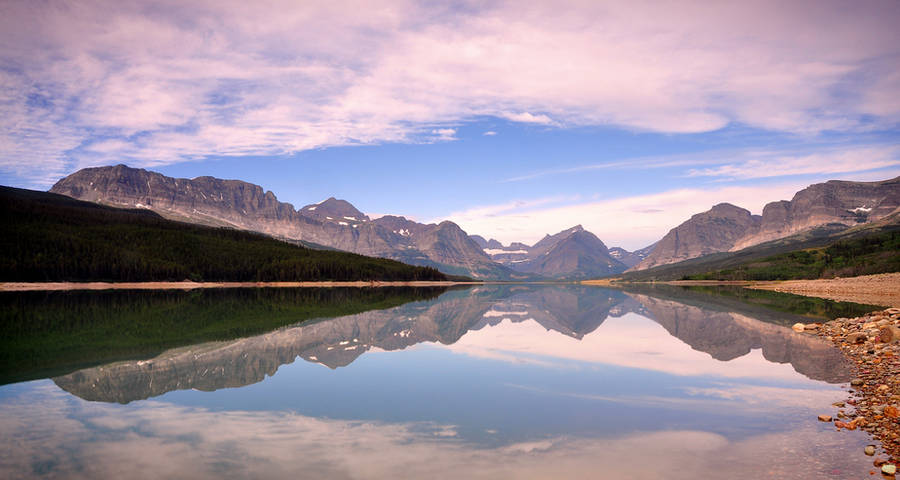 Lake Sherburne reflection by greglief