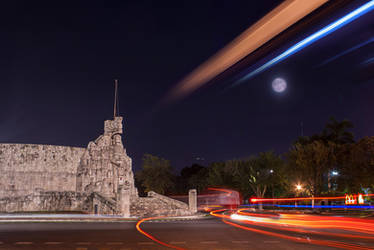 Night cityscape with full moon