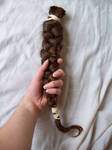holding human hair braid 2 by Stock-Tenchigirl15