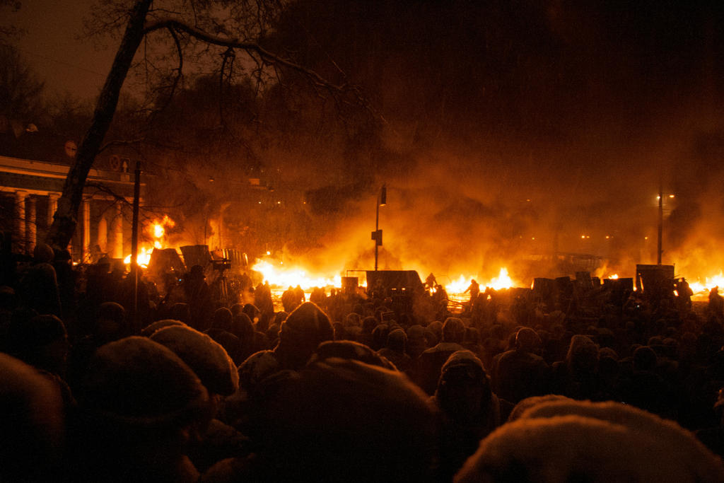 Crowd and wall of fire