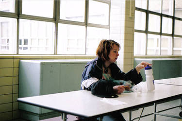 alone at a table of friends