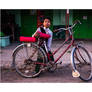 schoolboy with a bicycle