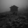 mountain hut in fog