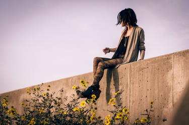 on the edge of the world, there are sunflowers