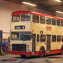 Old Hong Kong hot dog bus in garage