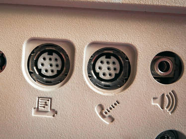 Backside of a Macintosh Classic computer