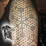 patterns on arm tattoo