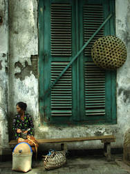 an old lady and a green window