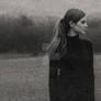 Solitary Figure in Vintage Grain and Fog