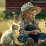 Farm boy in his straw hat with his cats