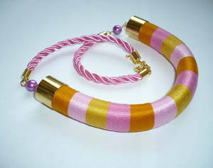 Orange and pink yarn wrapped necklace