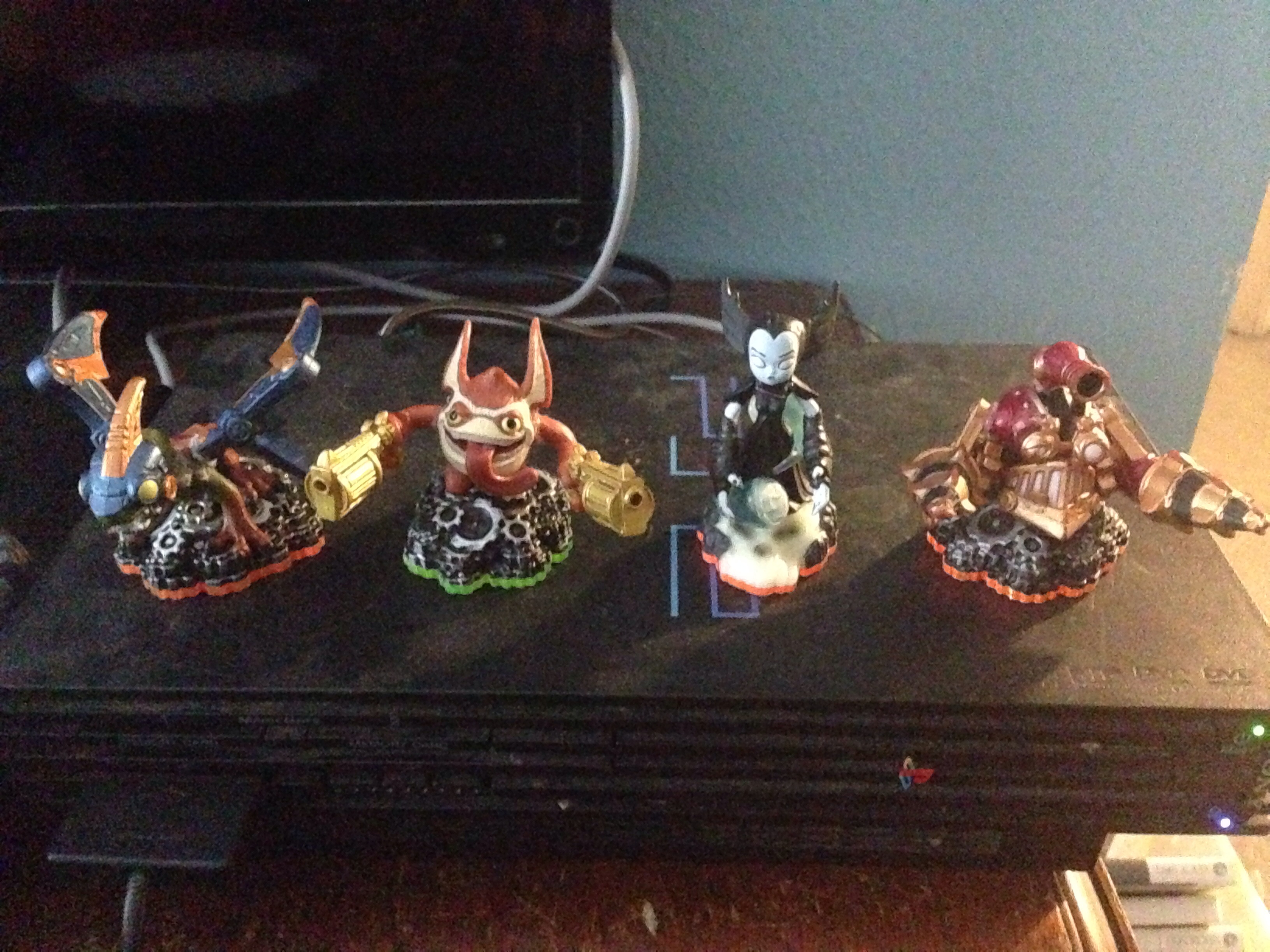 Four reposed Skylanders