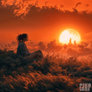 Girl sitting on grass weed on sun set (motion pic)