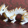 White and Gold Oriental Dragon - Auction