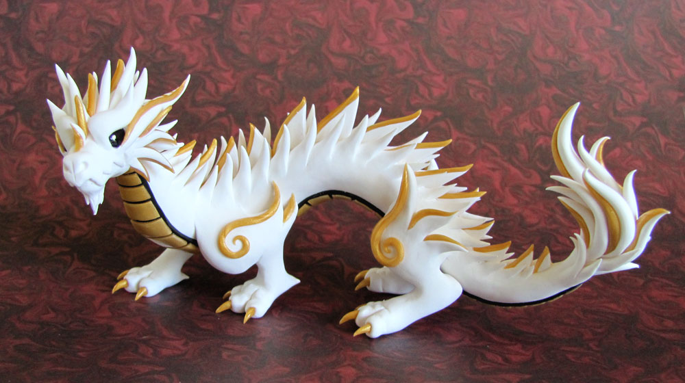 White and Gold Oriental Dragon - Auction