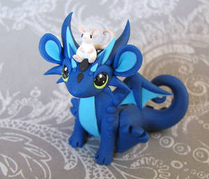 Blue dragon with mouse pal by DragonsAndBeasties